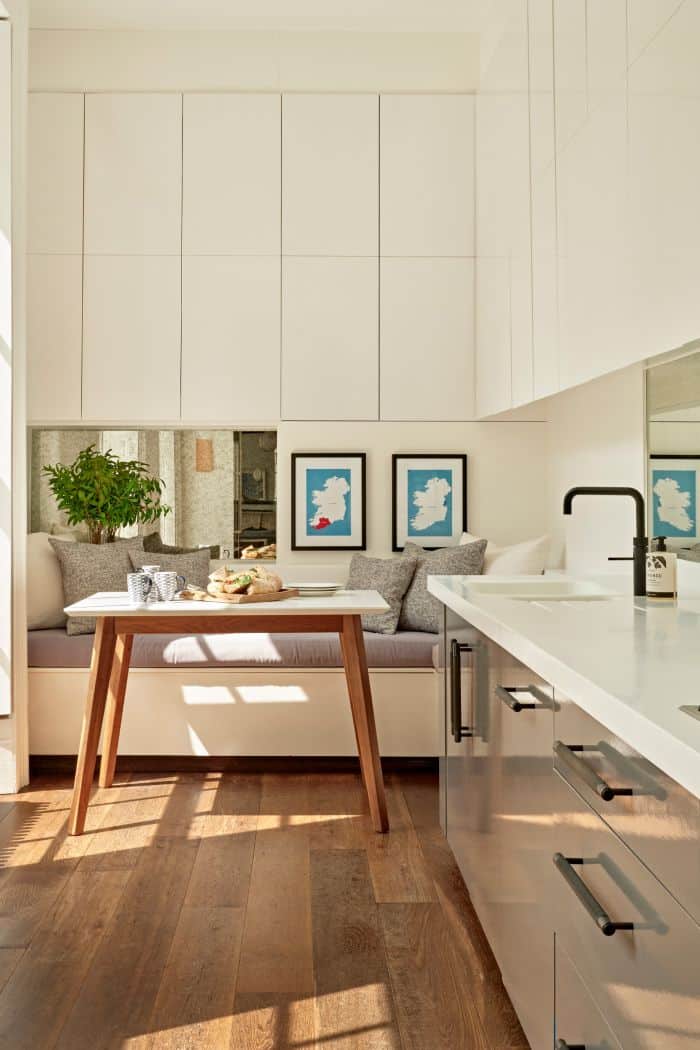 A long galley kitchen in a period london home. 