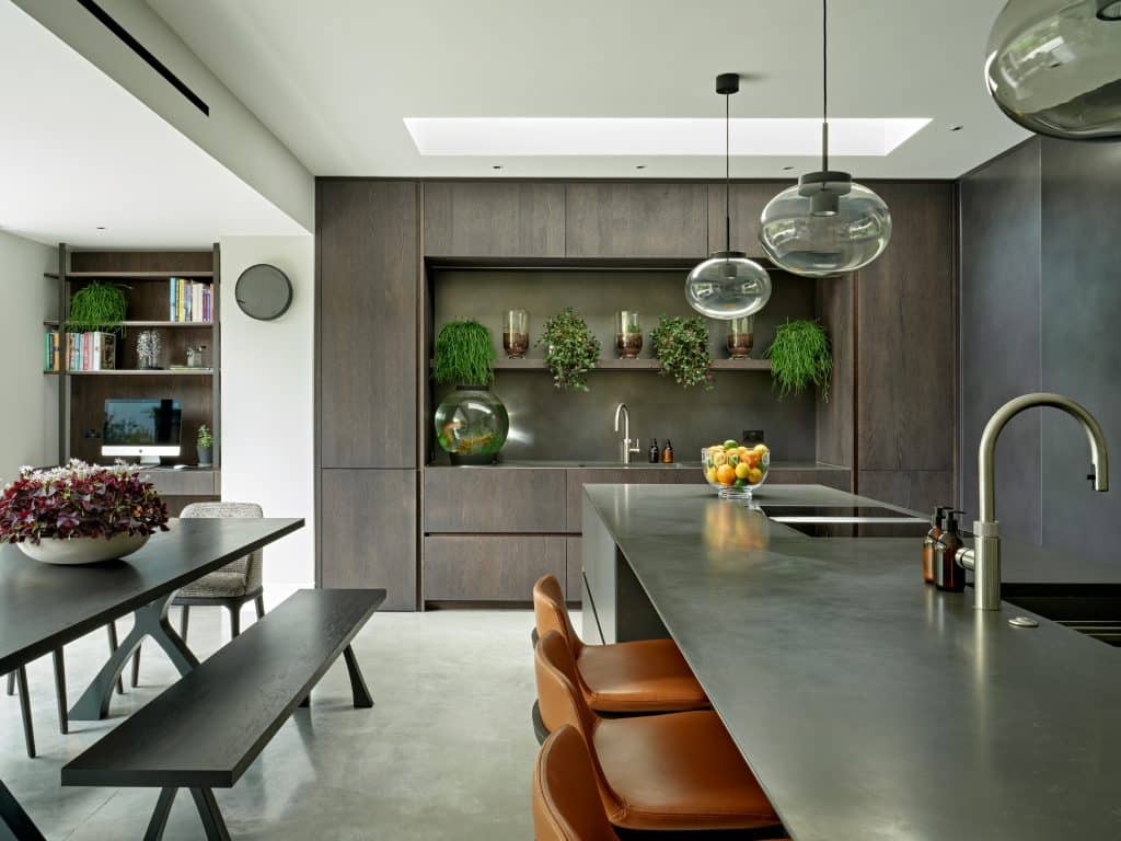 Open plan kitchen dining room in modern rear extension to London terraced house.