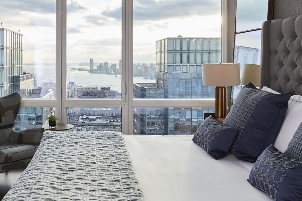 The view from the principle bedroom in a Manhattan Penthouse with a masculine colour palette.