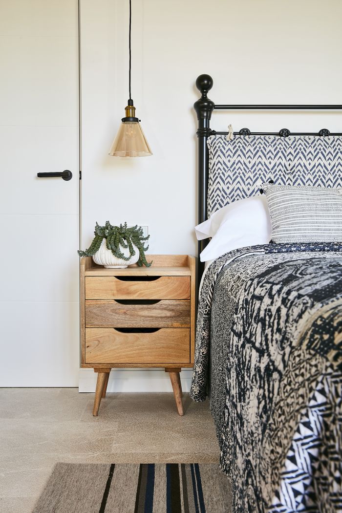 Wooden bedside table in coastal Mallorcan Villa