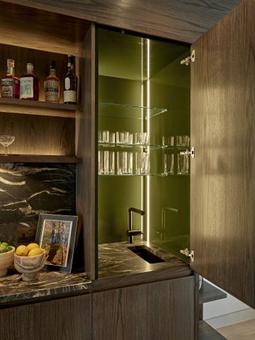 An elegant home bar in luxury London home.