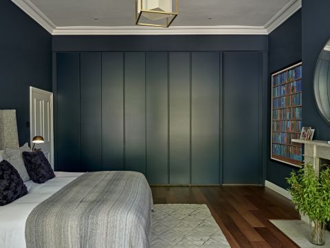 Oversized custom wardrobes in Hague Blue from Poliform wardobes.