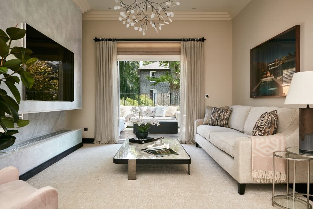 Neutral colour media room in period London Villa.