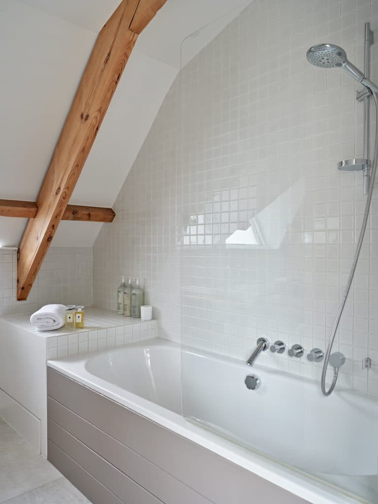 Shower Bath in neutral bathroom.