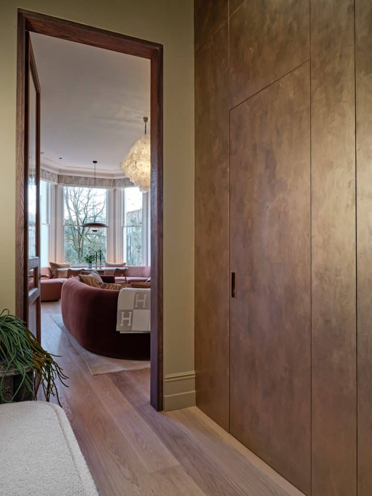 Entry from hallway to the living room in central London apartment.