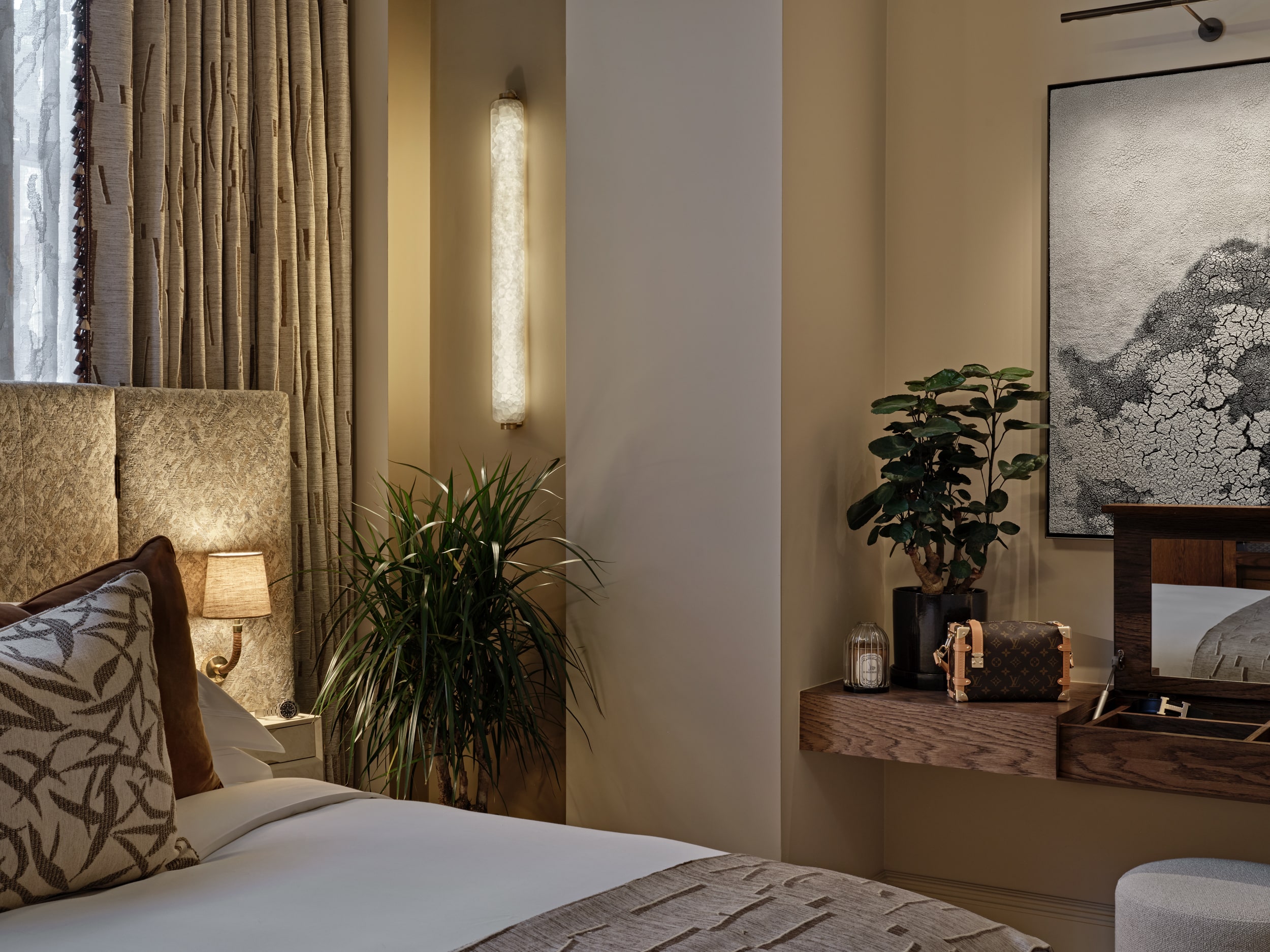 Neutral toned bedroom in Central London apartment.